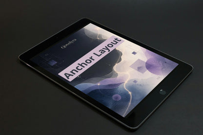 A black tablet device shown at an angle on a dark surface, with its screen on displaying the word 'Oryx' and a graphic layout titled 'Anchor Layout'.