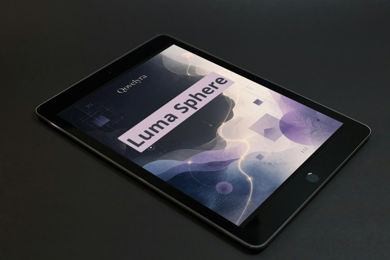 A black tablet device shown at an angle on a dark surface, with the screen on and displaying the text 'Omniva' and 'Luma Sphere' over an abstract purple and blue graphic.